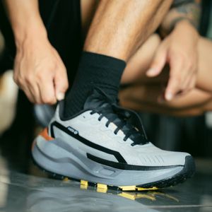 A close up of athletic shoes during exercise.